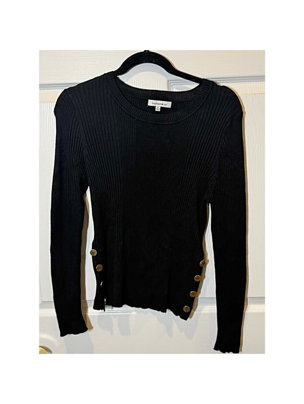 Rib knit sweater with side buttons